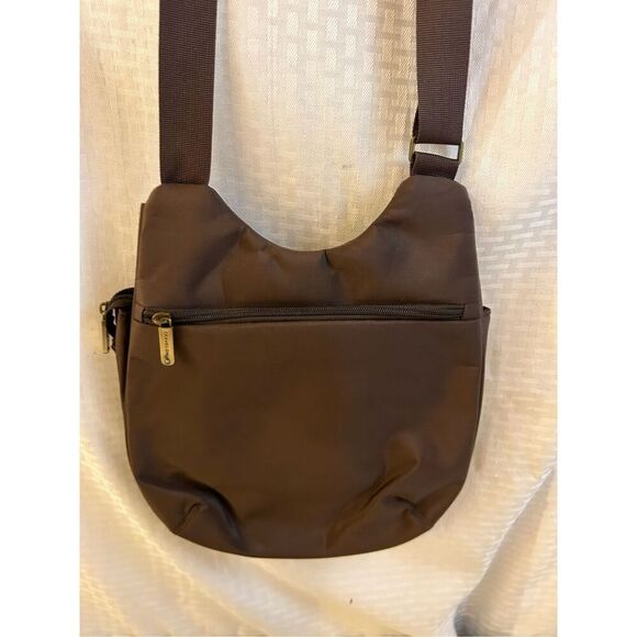 Travelon criss cross RDIF brown with animal print lined 10x12”multi compartment - Picture 5 of 11